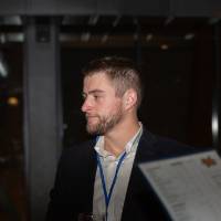 man with lanyard at giving tuesday